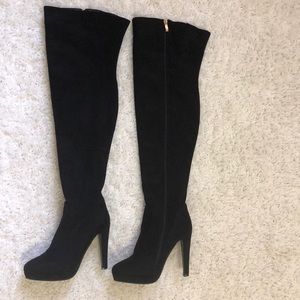 Black thigh high boots
